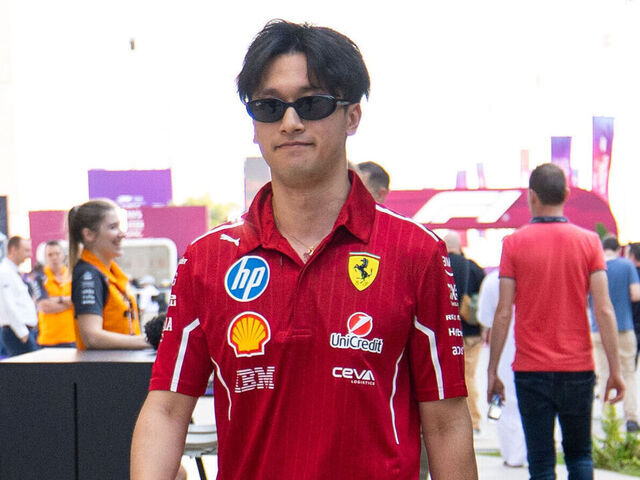 LUSAIL CITY, QATAR - NOVEMBER 28: Zhou Guanyu of China and Ferrari walks in the paddock during sprint qualifying ahead of the F1 Grand Prix of Qatar at Lusail International Circuit on November 28, 2025 in Lusail City, Qatar.