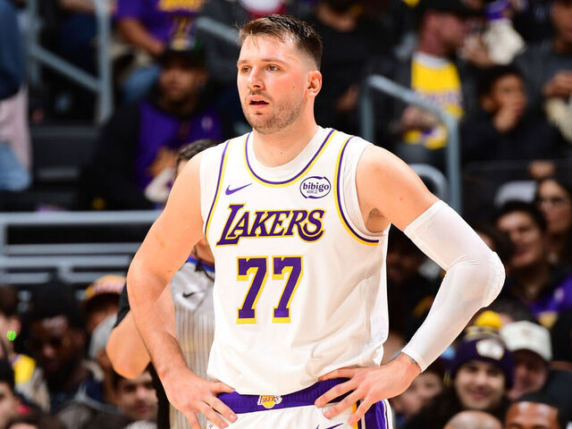 LOS ANGELES, CA - JANUARY 4: Luka Doncic #77 of the Los Angeles Lakers looks on during the game against the Memphis Grizzlies on January 4, 2026 at Crypto.Com Arena in Los Angeles, California. NOTE TO USER: User expressly acknowledges and agrees that, by downloading and/or using this Photograph, user is consenting to the terms and conditions of the Getty Images License Agreement. Mandatory Copyright Notice: Copyright 2026 NBAE