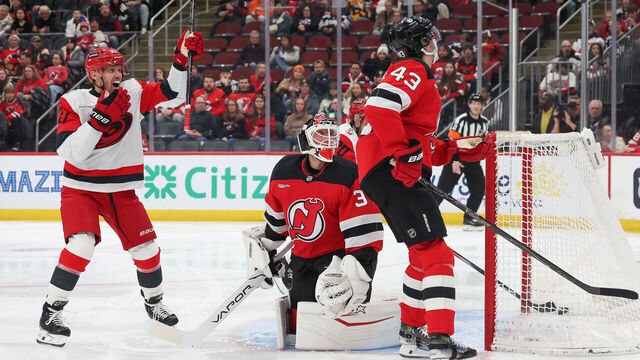 NEWARK, NEW JERSEY - JANUARY 04: Nikolaj Ehlers #27 of the Carolina Hurricanes celebrates an own goal during the first period by the New Jersey Devils at Prudential Center on January 4, 2026 in Newark, New Jersey.