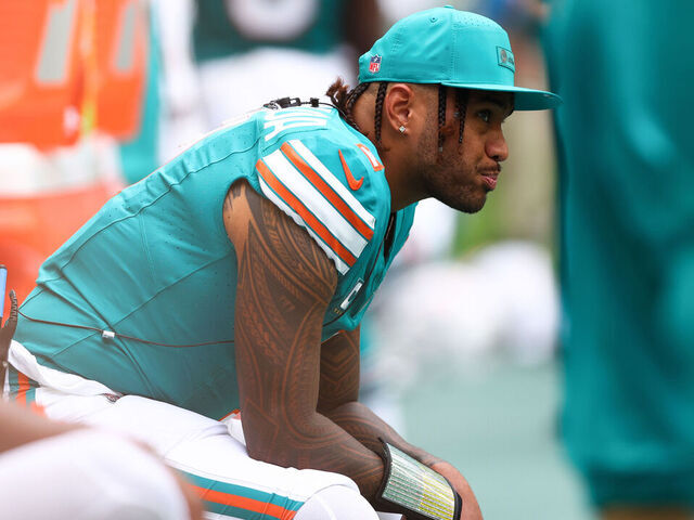 MIAMI GARDENS, FLORIDA - DECEMBER 21: Tua Tagovailoa #1 of the Miami Dolphins looks on during the second half of the game against the Cincinnati Bengals at Hard Rock Stadium on December 21, 2025 in Miami Gardens, Florida.