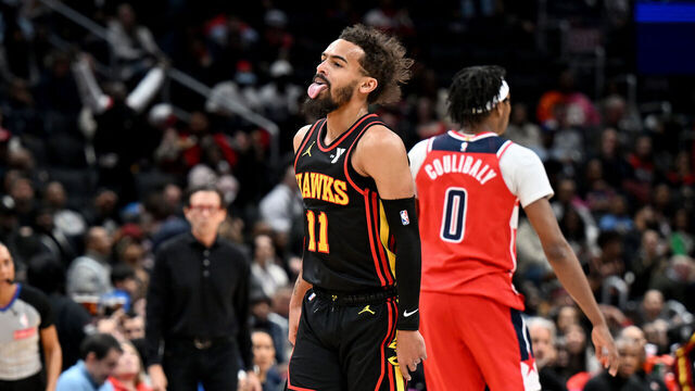 WASHINGTON, DC - FEBRUARY 08: Trae Young #11 of the Atlanta Hawks celebrates after scoring in the second quarter against the Washington Wizards at Capital One Arena on February 08, 2025 in Washington, DC.
