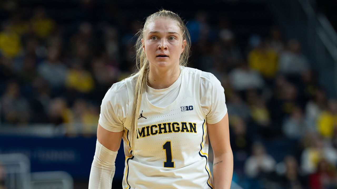ANN ARBOR, MICHIGAN - DECEMBER 21: Olivia Olson #1 of the Michigan Wolverines looks on during the first quarter against the Oakland Golden Grizzlies at Crisler Arena on December 21, 2025 in Ann Arbor, Michigan.