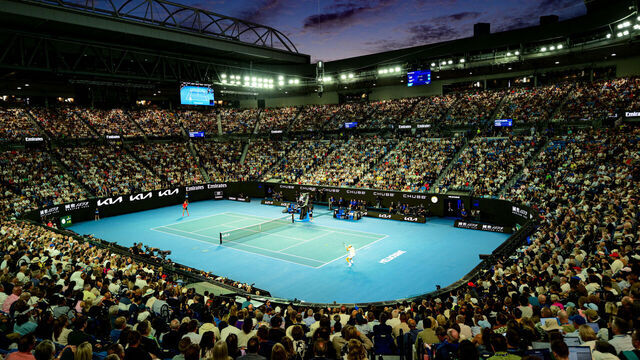 TOPSHOT - A general view as Italy's Jannik Sinner (R) hits a return against Germany's Alexander Zverev during their men's singles final match on day fifteen of the Australian Open tennis tournament in Melbourne on January 26, 2025.