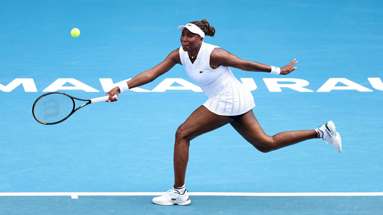 AUCKLAND, NEW ZEALAND - JANUARY 06: Venus Williams of USA plays a shot in her match against Magda Linette of Poland during day two of the 2025 ASB Classic at ASB Tennis Centre on January 06, 2026 in Auckland, New Zealand.