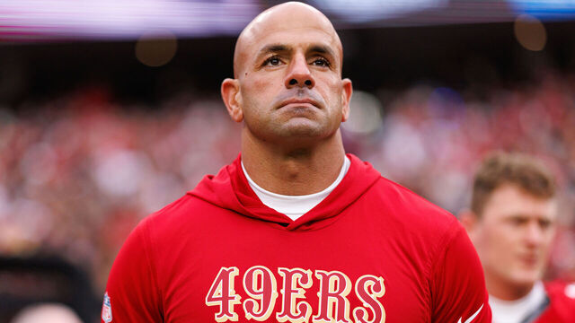 SANTA CLARA, CALIFORNIA - DECEMBER 14: Defensive coordinator Robert Saleh of the San Francisco 49ers stands on the sidelines during the national anthem prior to an NFL football game against the Tennessee Titans at Levi's Stadium on December 14, 2025 in Santa Clara, California.