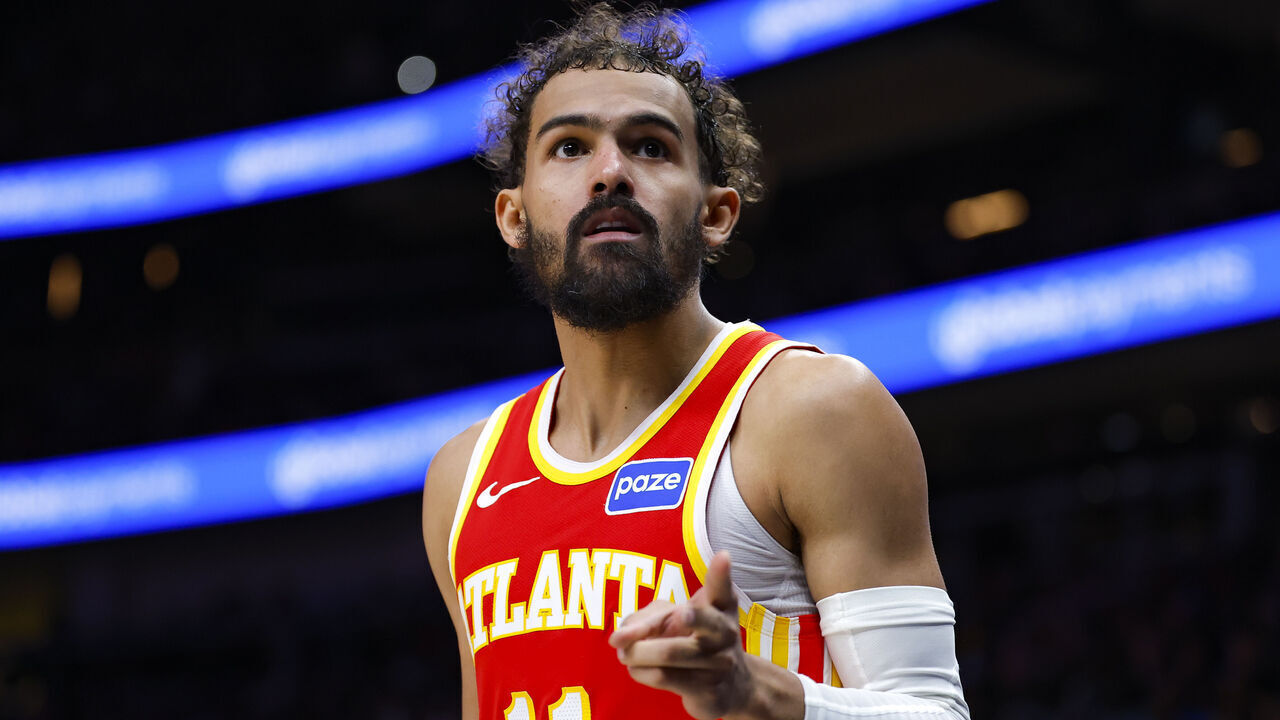 ATLANTA, GEORGIA - DECEMBER 27: Trae Young #11 of the Atlanta Hawks reacts during the third quarter against the New York Knicks at State Farm Arena on December 27, 2025 in Atlanta, Georgia.