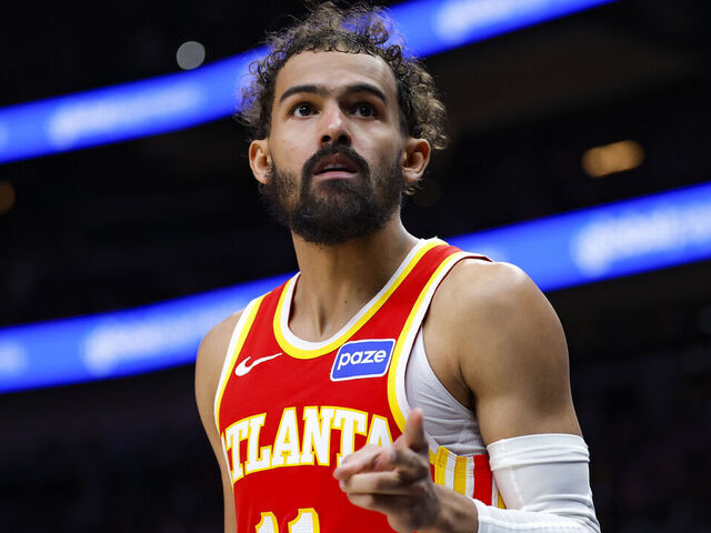 ATLANTA, GEORGIA - DECEMBER 27: Trae Young #11 of the Atlanta Hawks reacts during the third quarter against the New York Knicks at State Farm Arena on December 27, 2025 in Atlanta, Georgia.