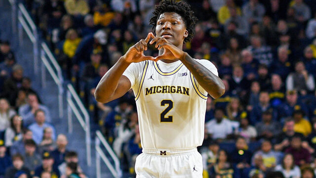 ANN ARBOR, MICHIGAN - JANUARY 02: L.J. Cason #2 of the Michigan Wolverines signals to his teammates during the first half of a college basketball game against the Southern California Trojans at Crisler Arena on January 02, 2026 in Ann Arbor, Michigan.