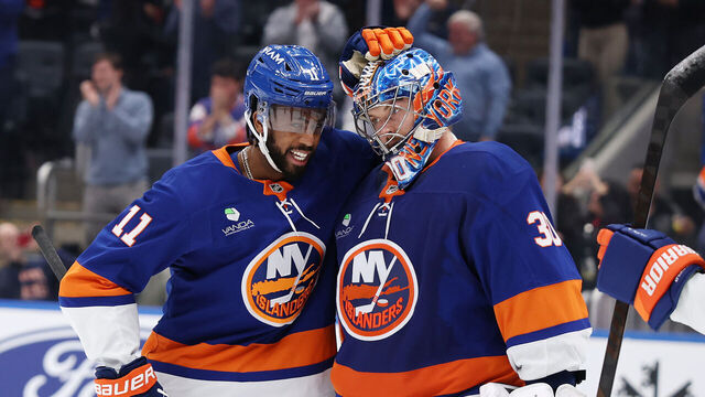 ELMONT, NEW YORK - JANUARY 06: Anthony Duclair #11 of the New York Islanders congratulates Ilya Sorokin #30 of the New York Islanders after he became the New York Islanders all time shutout leader with a 9-0 win against the New Jersey Devils during their game at UBS Arena on January 06, 2026 in Elmont, New York. This is the 26th shutout for Sorokin with the New York Islanders.
