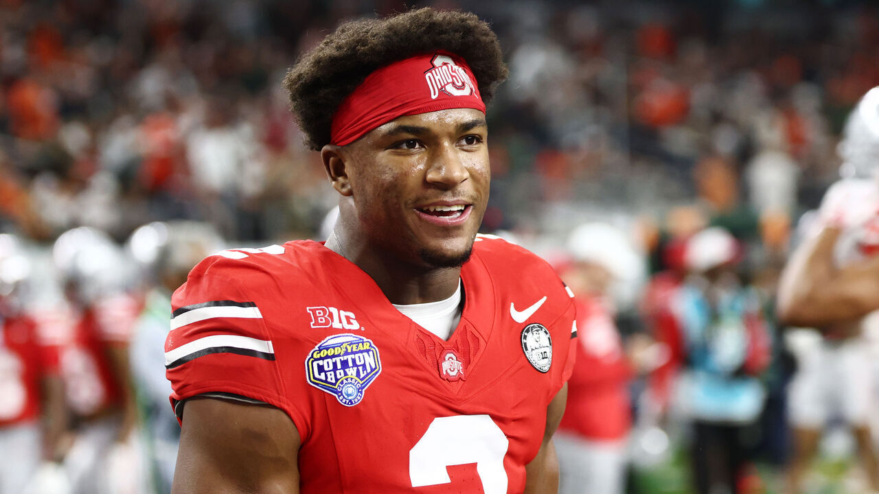 ARLINGTON, TEXAS - DECEMBER 31:: Caleb Downs #2 of the Ohio State Buckeyes looks on prior to the College Football Playoff Quarter Final Game against the Miami (FL) Hurricanes at AT&T Stadium on December 31, 2025 in Arlington, Texas.
