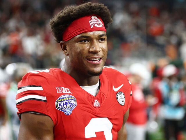 ARLINGTON, TEXAS - DECEMBER 31:: Caleb Downs #2 of the Ohio State Buckeyes looks on prior to the College Football Playoff Quarter Final Game against the Miami (FL) Hurricanes at AT&T Stadium on December 31, 2025 in Arlington, Texas.