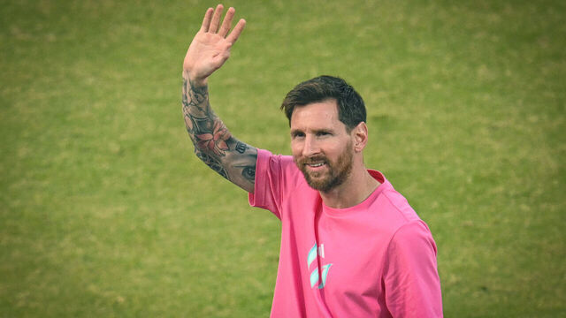 NEW DELHI, INDIA - DECEMBER 15: Lionel Messi, Argentine footballer greets his fans during GOAT India Tour at Arun Jaitley Stadium on December 15, 2025 in New Delhi, India. Lionel Messi concluded his GOAT India Tour in Delhi, a stark contrast to its chaotic Kolkata start. Fans at Arun Jaitley Stadium cheered as the football icon expressed gratitude for the overwhelming affection shown during his brief but memorable visit. Messi promised a return, leaving a lasting impression on his admirers.
