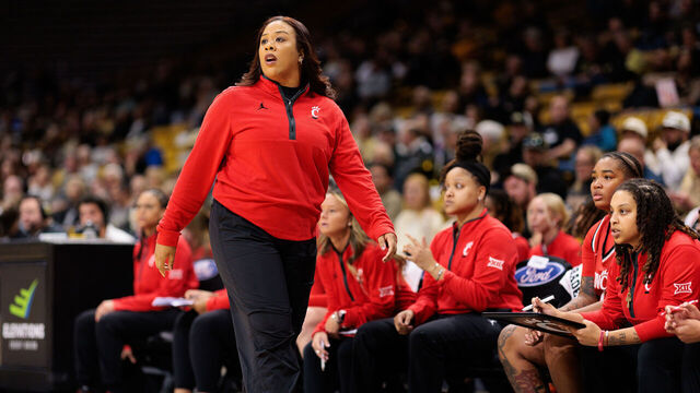 BOULDER, COLORADO - JANUARY 03: Head coach Katrina Merriweather of the Cincinnati Bearcats walks the court during the first quarter against the Colorado Buffaloes at the CU Events Center on January 03, 2026 in Boulder, Colorado.