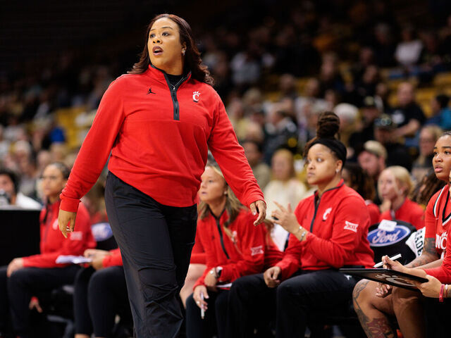BOULDER, COLORADO - JANUARY 03: Head coach Katrina Merriweather of the Cincinnati Bearcats walks the court during the first quarter against the Colorado Buffaloes at the CU Events Center on January 03, 2026 in Boulder, Colorado.