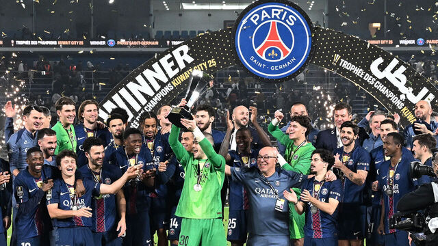 TOPSHOT - PSG's players celebrate with the trophy after winning the French Champions' Trophy (Trophee des Champions) football match between Paris Saint-Germain (PSG) and Olympique de Marseille (OM) at the Jaber Al-Ahmad International Stadium in Kuwait City on January 8, 2026.