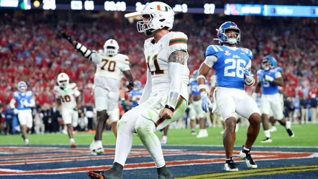 GLENDALE, ARIZONA - JANUARY 08: Carson Beck #11 of the Miami Hurricanes celebrates a touchdown against the Ole Miss Rebels in the fourth quarter during the 2025 College Football Playoff Semifinal at the VRBO Fiesta Bowl at State Farm Stadium on January 08, 2026 in Glendale, Arizona. The Hurricanes defeated the Rebels 31-27.