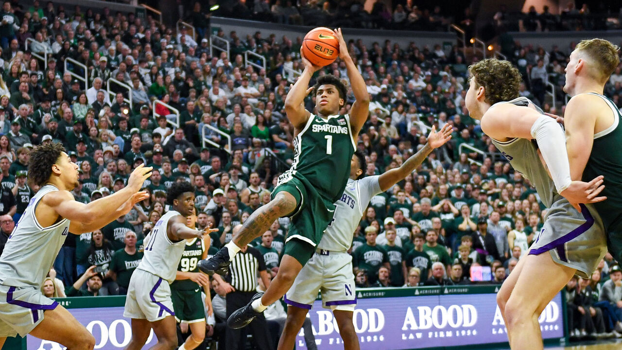 EAST LANSING, MICHIGAN - JANUARY 08: Jeremy Fears Jr. #1 of the Michigan State Spartans attempts a shot in front of Jayden Reid #4, Tre Singleton #8, and Max Green #10 of the Northwestern Wildcats during the second half of the college basketball game at Breslin Center on January 08, 2026 in East Lansing, Michigan. The Michigan State Spartans won the game 76-66.