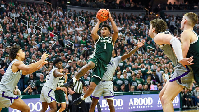 EAST LANSING, MICHIGAN - JANUARY 08: Jeremy Fears Jr. #1 of the Michigan State Spartans attempts a shot in front of Jayden Reid #4, Tre Singleton #8, and Max Green #10 of the Northwestern Wildcats during the second half of the college basketball game at Breslin Center on January 08, 2026 in East Lansing, Michigan. The Michigan State Spartans won the game 76-66.