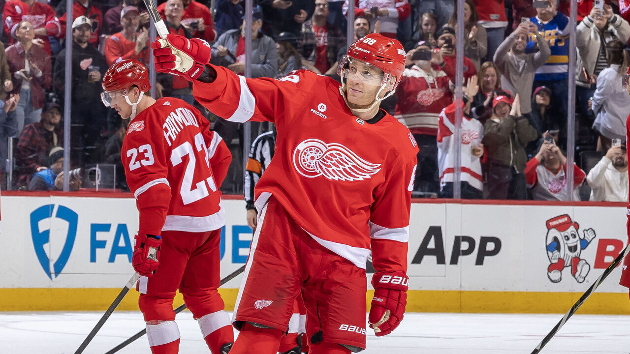 DETROIT, MICHIGAN - JANUARY 08: Patrick Kane #88 of the Detroit Red Wings salutes the fans after his 500th NHL goal against the Vancouver Canucks late in the third period at Little Caesars Arena on January 8, 2026 in Detroit, Michigan.