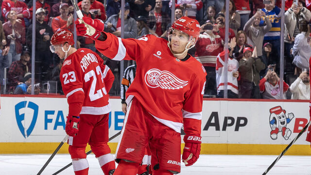 DETROIT, MICHIGAN - JANUARY 08: Patrick Kane #88 of the Detroit Red Wings salutes the fans after his 500th NHL goal against the Vancouver Canucks late in the third period at Little Caesars Arena on January 8, 2026 in Detroit, Michigan.