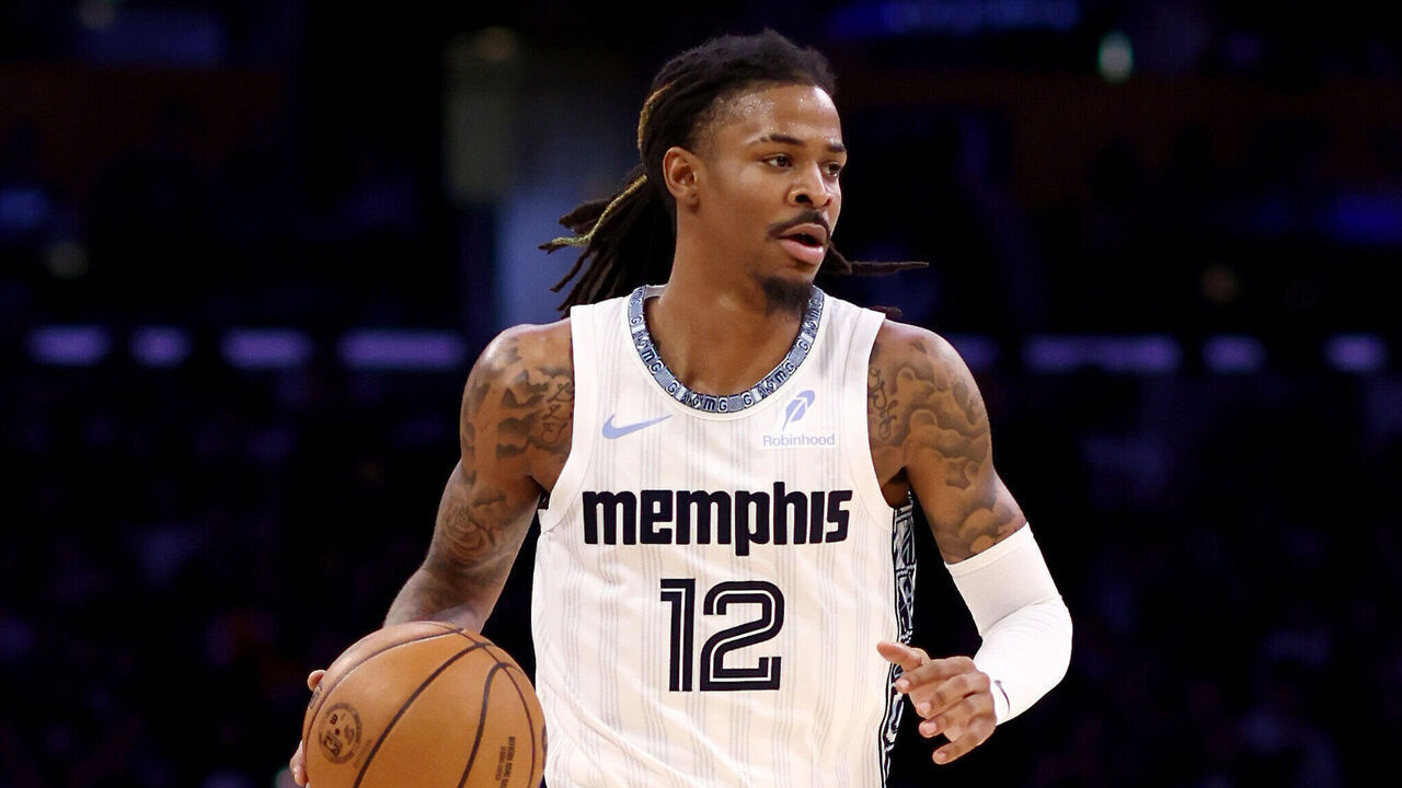 LOS ANGELES, CALIFORNIA - JANUARY 02: Ja Morant #12 of the Memphis Grizzlies brings the ball up court during the second quarter against the Los Angeles Lakers at Crypto.com Arena on January 02, 2026 in Los Angeles, California.