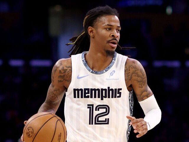 LOS ANGELES, CALIFORNIA - JANUARY 02: Ja Morant #12 of the Memphis Grizzlies brings the ball up court during the second quarter against the Los Angeles Lakers at Crypto.com Arena on January 02, 2026 in Los Angeles, California.