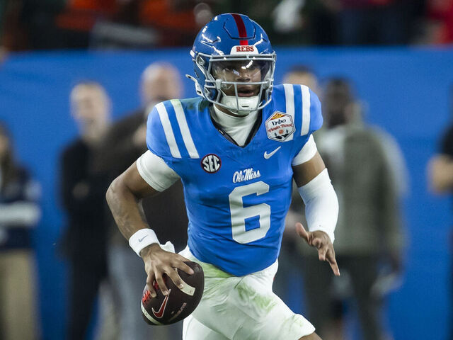 GLENDALE, AZ - JANUARY 08: QB Trinidad Chambliss #6 of the Ole Miss Rebels scrambles with the ball during the Miami Hurricanes versus Ole Miss Rebels College Football Playoff Semifinal at the Vrbo Fiesta Bowl on January 8, 2026, at State Farm Stadium in Glendale, AZ.