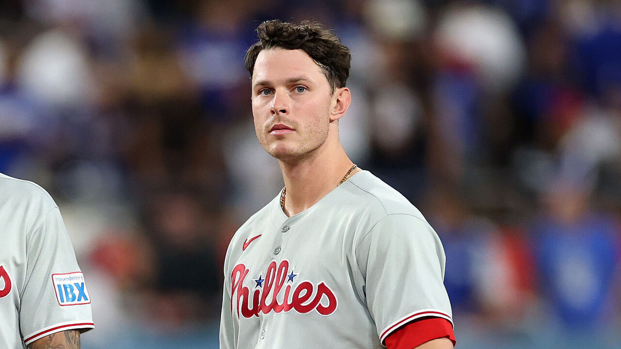 LOS ANGELES, CALIFORNIA - SEPTEMBER 17: Nick Castellanos #8 and Max Kepler #17 of the Philadelphia Phillies react against the Los Angeles Dodgers during the seventh inning at Dodger Stadium on September 17, 2025 in Los Angeles, California.