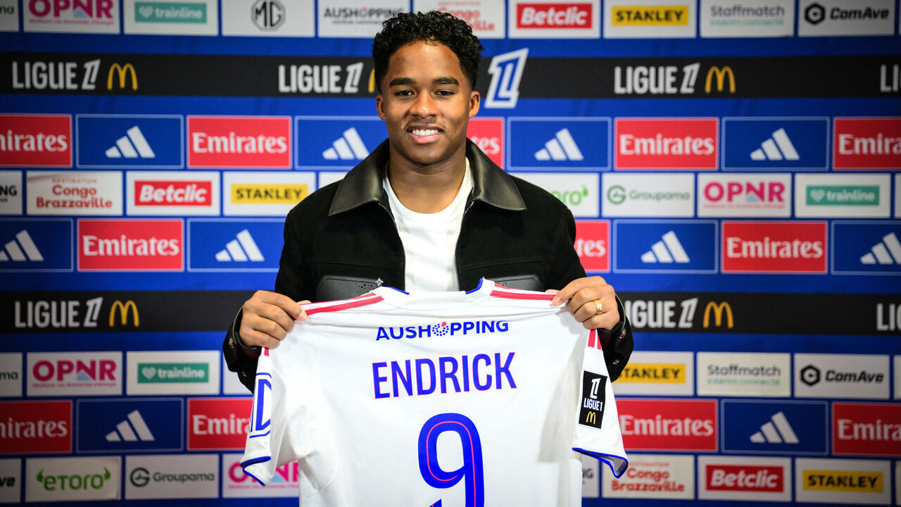 Olympique Lyonnais' Brazilian forward #09 Endrick poses with his jersey as he takes part in his official presentation press conference at the OL training centre in Decines-Charpieu, in the suburbs of Lyon, central-eastern France, on January 5, 2026.
