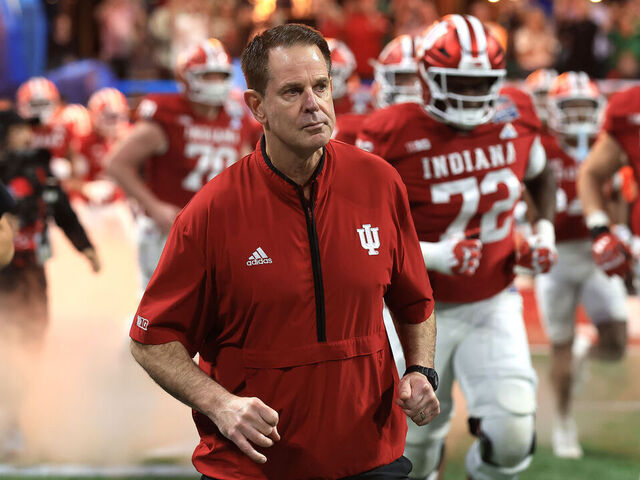 ATLANTA, GA - JANUARY 09: Head Coach Curt Cignetti of the Indiana Hoosiers leads his team onto the field for the Indiana Hoosiers versus Oregon Ducks College Football Playoff Semifinal at the Chick-fil-A Peach Bowl on January 9, 2026, at Mercedes-Benz Stadium in Atlanta, GA.
