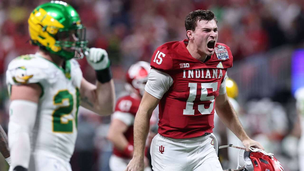 ATLANTA, GEORGIA - JANUARY 09: Fernando Mendoza #15 of the Indiana Hoosiers celebrates a touchdown pass against the Oregon Ducks during the second quarter in the 2025 College Football Playoff Semifinal at the Chick-fil-A Peach Bowl at Mercedes-Benz Stadium on January 09, 2026 in Atlanta, Georgia.