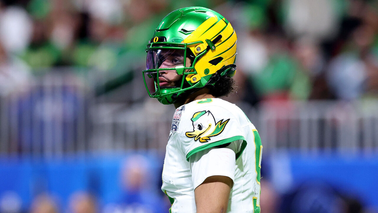 ATLANTA, GEORGIA - JANUARY 09: Dante Moore #5 of the Oregon Ducks reacts after a team penalty during the third quarter in the 2025 College Football Playoff Semifinal against the Indiana Hoosiers at the Chick-fil-A Peach Bowl at Mercedes-Benz Stadium on January 09, 2026 in Atlanta, Georgia.