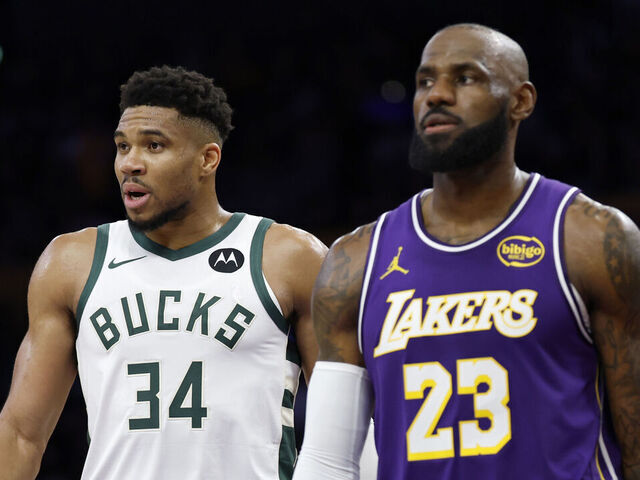 LOS ANGELES, CALIFORNIA - JANUARY 09: Giannis Antetokounmpo #34 of the Milwaukee Bucks follows LeBron James #23 of the Los Angeles Lakers to the court during a 105-101 Bucks win at Crypto.com Arena on January 09, 2026 in Los Angeles, California.