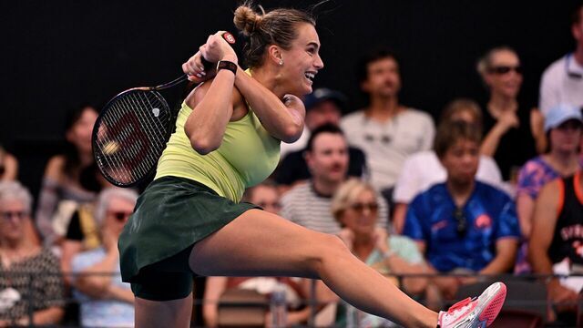 TOPSHOT - Aryna Sabalenka of Belarus hits a return during her women's singles semi-final match against Karolina Muchova of Czech Republic at the Brisbane International tennis tournament in Brisbane on January 10, 2026. / --IMAGE RESTRICTED TO EDITORIAL USE - STRICTLY NO COMMERCIAL USE--