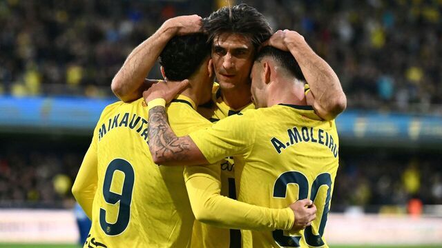 Villarreal's French forward #09 Georges Mikautadze celebrates scoring his team's third goal with Villarreal's Spanish forward #20 Alberto Moleiro and Villarreal's Spanish forward #07 Gerard who scores previously during the Spanish league football match between Villarreal CF and Deportivo Alaves at La Ceramica Stadium in Vila-real on January 10, 2026.