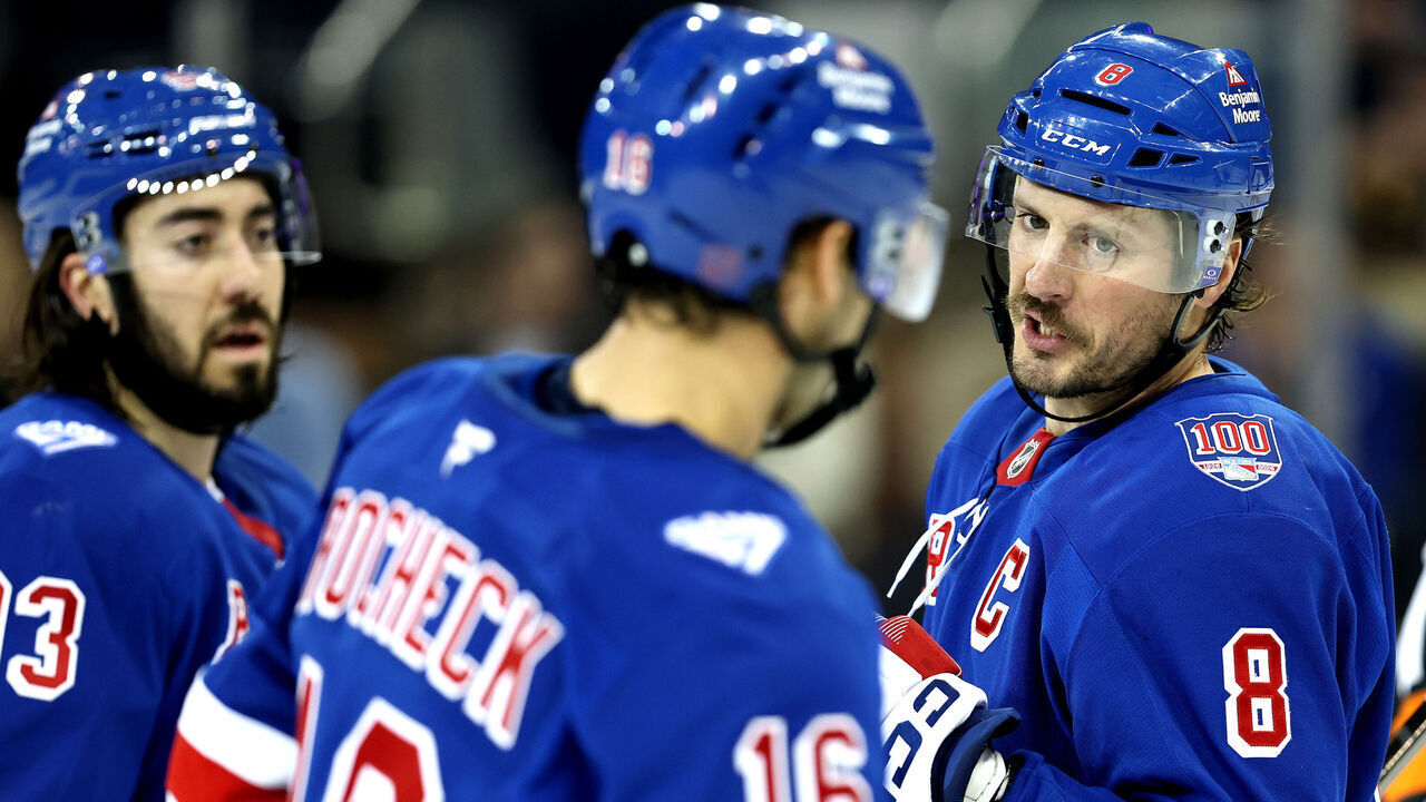 NEW YORK, NEW YORK - DECEMBER 06: J.T. Miller #8 of the New York Rangers speaks with Vincent Trocheck #16 during the game against the Colorado Avalanche at Madison Square Garden on December 06, 2025 in New York City.