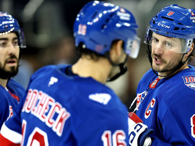 NEW YORK, NEW YORK - DECEMBER 06: J.T. Miller #8 of the New York Rangers speaks with Vincent Trocheck #16 during the game against the Colorado Avalanche at Madison Square Garden on December 06, 2025 in New York City.