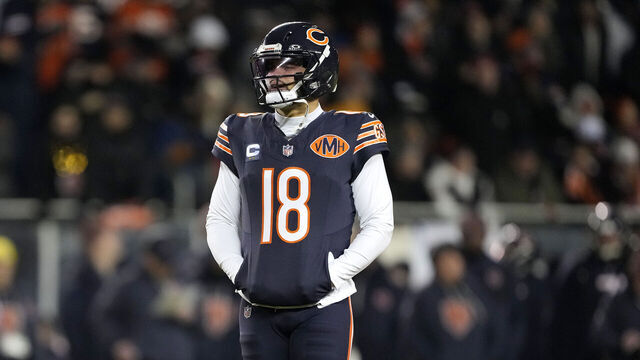 CHICAGO, ILLINOIS - JANUARY 10: Caleb Williams #18 of the Chicago Bears looks on against the Green Bay Packers during the first quarter in the NFC Wild Card Playoff game at Soldier Field on January 10, 2026 in Chicago, Illinois.