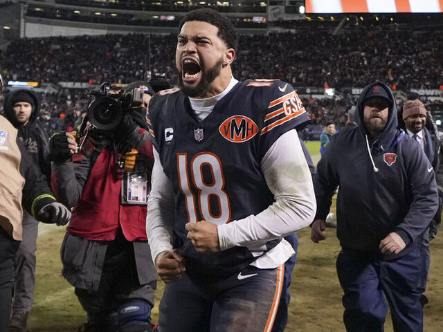 CHICAGO, ILLINOIS - JANUARY 10: Caleb Williams #18 of the Chicago Bears celebrates after an NFL Wild Card game against the Green Bay Packers at Solider Field on January 10, 2026 in Chicago, Illinois.
