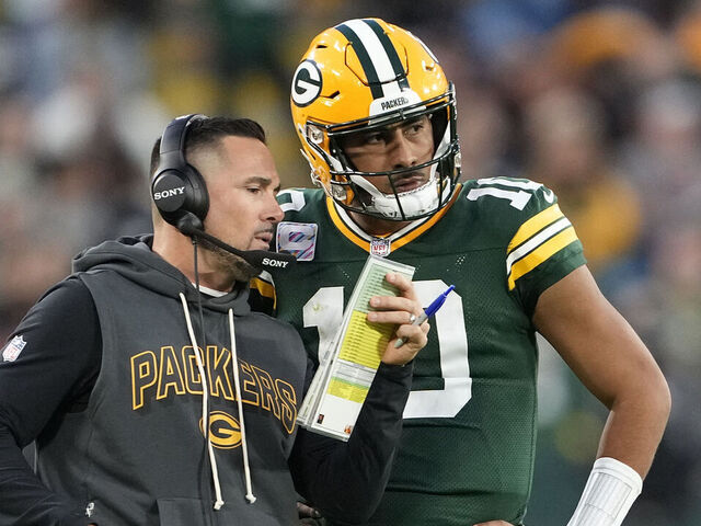 GREEN BAY, WISCONSIN - OCTOBER 12: Head coach Matt LaFleur of the Green Bay Packers talks with Jordan Love #10 during a timeout in the fourth quarter in the game against the Cincinnati Bengals at Lambeau Field on October 12, 2025 in Green Bay, Wisconsin.