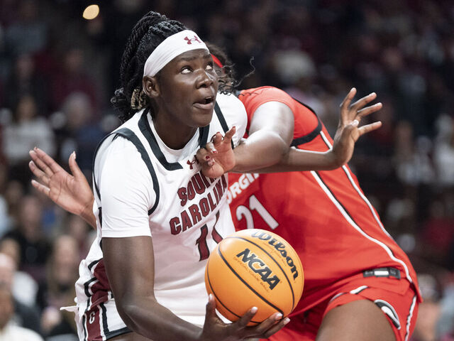COLUMBIA, SOUTH CAROLINA - JANUARY 11: Madina Okot #11 of the South Carolina Gamecocks shoots the ball during the first quarter of an NCAA women's basketball game against Aicha Ndour #21 of the Georgia Bulldogs at Colonial Life Arena on January 11, 2026 in Columbia, South Carolina.
