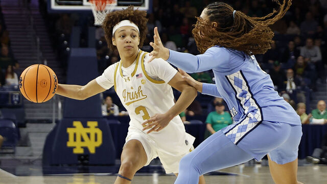 SOUTH BEND, IN - JANUARY 11: Notre Dame Fighting Irish guard Hannah Hidalgo (3) makes the pass around North Carolina Tar Heels guard Taliyah Henderson (3) in the second half of play during a women's college basketball game between the North Carolina Tar Heels and the Notre Dame Fighting Irish on January 11, 2026, at Purcell Pavilion in South Bend, IN.
