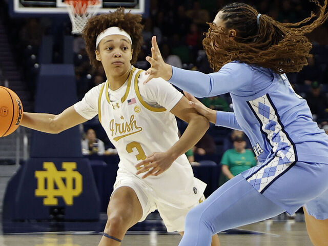 SOUTH BEND, IN - JANUARY 11: Notre Dame Fighting Irish guard Hannah Hidalgo (3) makes the pass around North Carolina Tar Heels guard Taliyah Henderson (3) in the second half of play during a women's college basketball game between the North Carolina Tar Heels and the Notre Dame Fighting Irish on January 11, 2026, at Purcell Pavilion in South Bend, IN.