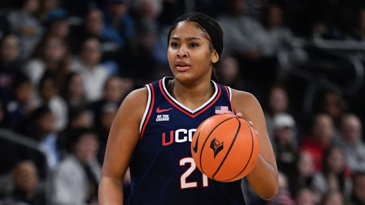 PROVIDENCE, RI - DECEMBER 31: Sarah Strong #21 of the UConn Huskies dribbles the ball during the women's college basketball game between the UConn Huskies and the Providence College Friars on December 31, 2025, at Amica Mutual Pavilion in Providence, RI.