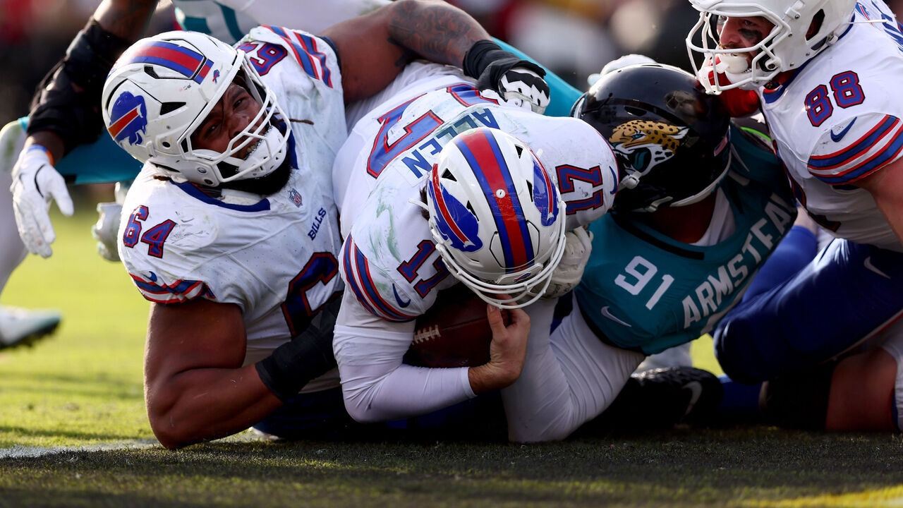 JACKSONVILLE, FLORIDA - JANUARY 11: Josh Allen #17 of the Buffalo Bills rushes for a touchdown during the fourth quarter against the Jacksonville Jaguars in the AFC Wild Card Playoff game at EverBank Stadium on January 11, 2026 in Jacksonville, Florida.