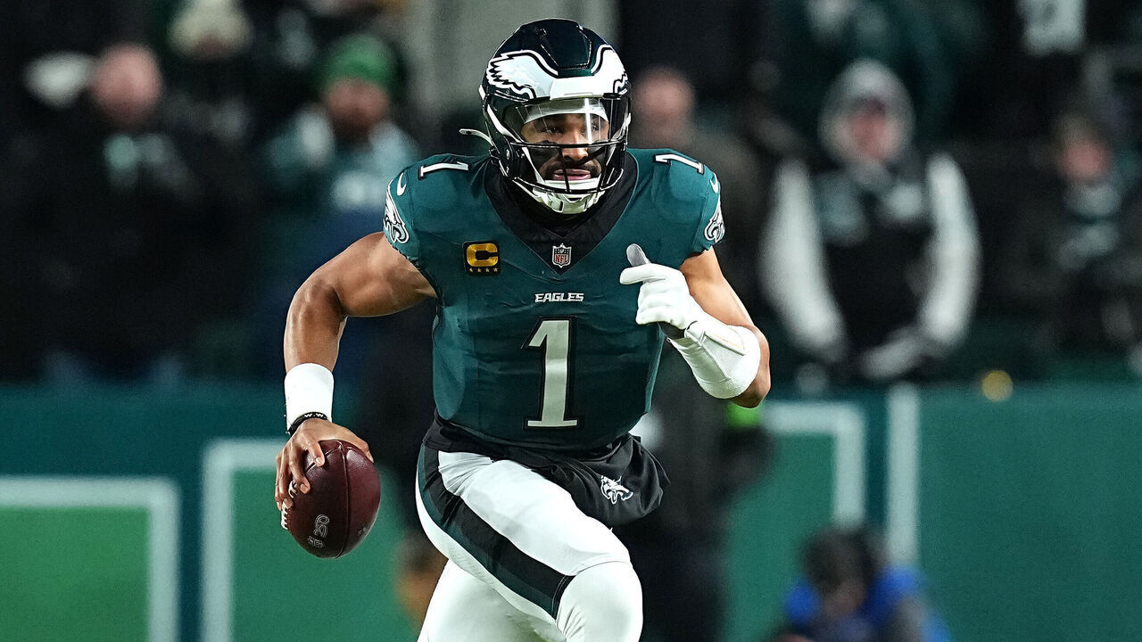 PHILADELPHIA, PENNSYLVANIA - JANUARY 11: Jalen Hurts #1 of the Philadelphia Eagles scrambles against the San Francisco 49ers during the fourth quarter in the NFC Wild Card Playoff game at Lincoln Financial Field on January 11, 2026 in Philadelphia, Pennsylvania.