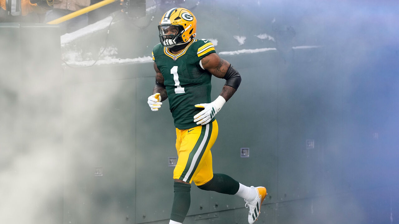 GREEN BAY, WISCONSIN - DECEMBER 07: Micah Parsons #1 of the Green Bay Packers runs out of tunnel before game against the Chicago Bears at Lambeau Field on December 07, 2025 in Green Bay, Wisconsin.