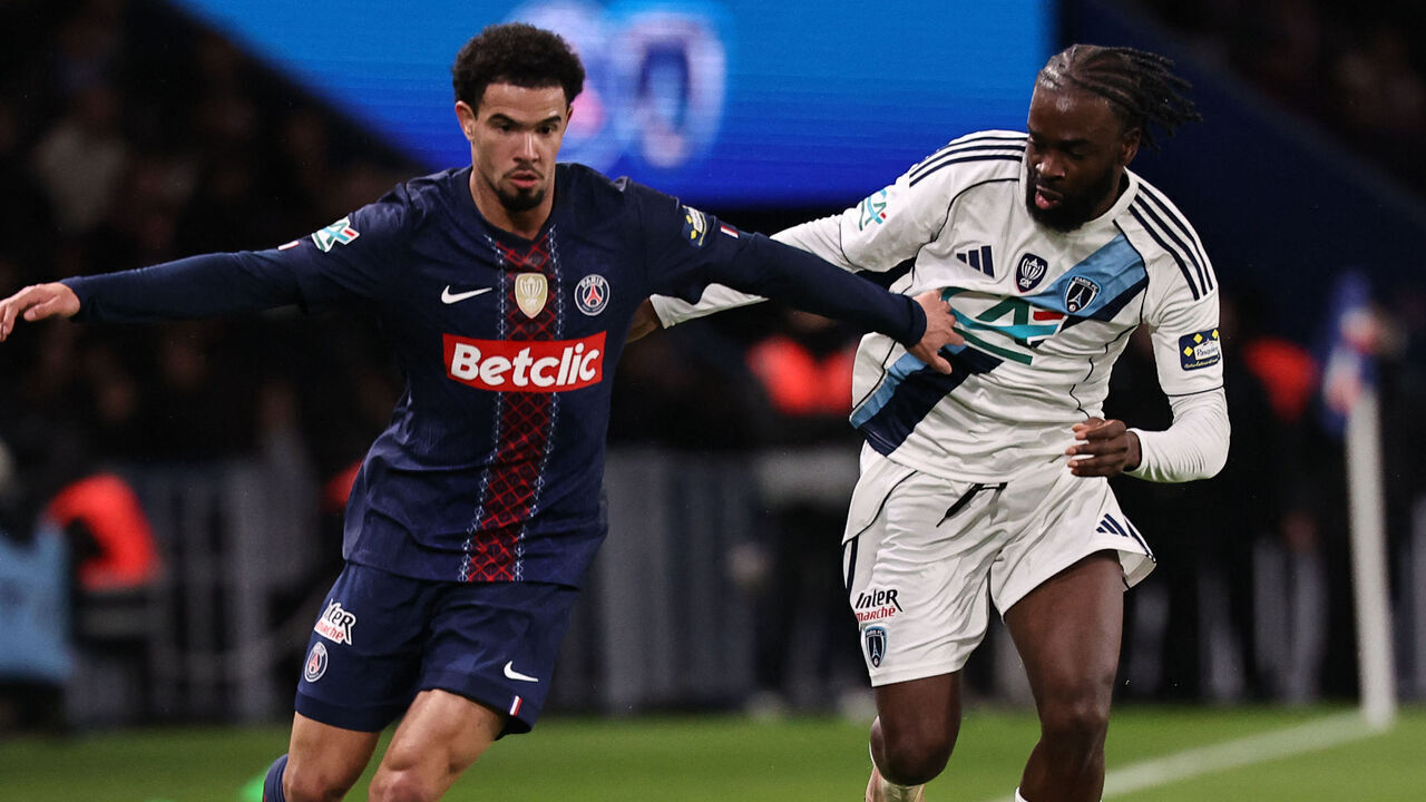 Paris Saint-Germain's French midfielder #02 Warren Zaire-Emery and Paris FC's French midfielder #14 Jonathan Ikone fight for the ball during the French Cup round of 32 football match between Paris Saint-Germain (PSG) and Paris FC at the Parc des Princes stadium in Paris on January 12, 2026.