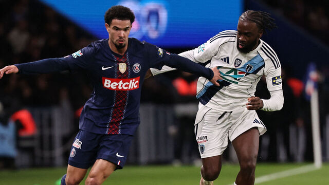 Paris Saint-Germain's French midfielder #02 Warren Zaire-Emery and Paris FC's French midfielder #14 Jonathan Ikone fight for the ball during the French Cup round of 32 football match between Paris Saint-Germain (PSG) and Paris FC at the Parc des Princes stadium in Paris on January 12, 2026.