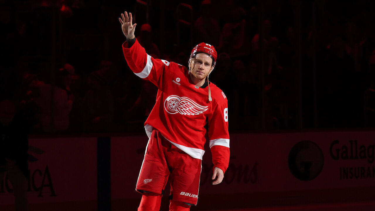 DETROIT, MICHIGAN - JANUARY 08: Patrick Kane #88 of the Detroit Red Wings celebrates with fans being named the first star of the game after a 5-1 win over the Vancouver Canucks where he scored his 500th career goal at Little Caesars Arena on January 08, 2026 in Detroit, Michigan.